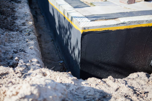 Professional Basement Waterproofing technician working in Vancouver, WA